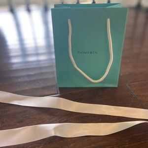 Small Tiffany & Co. bag with original ribbon